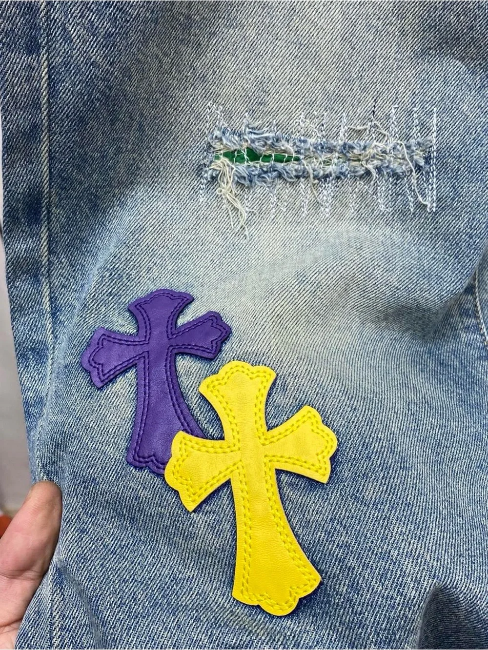 Chrome Hearts Blue Wide-Leg Jeans with Purple & Yellow Cross Appliqués